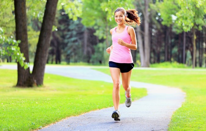 Running woman in park